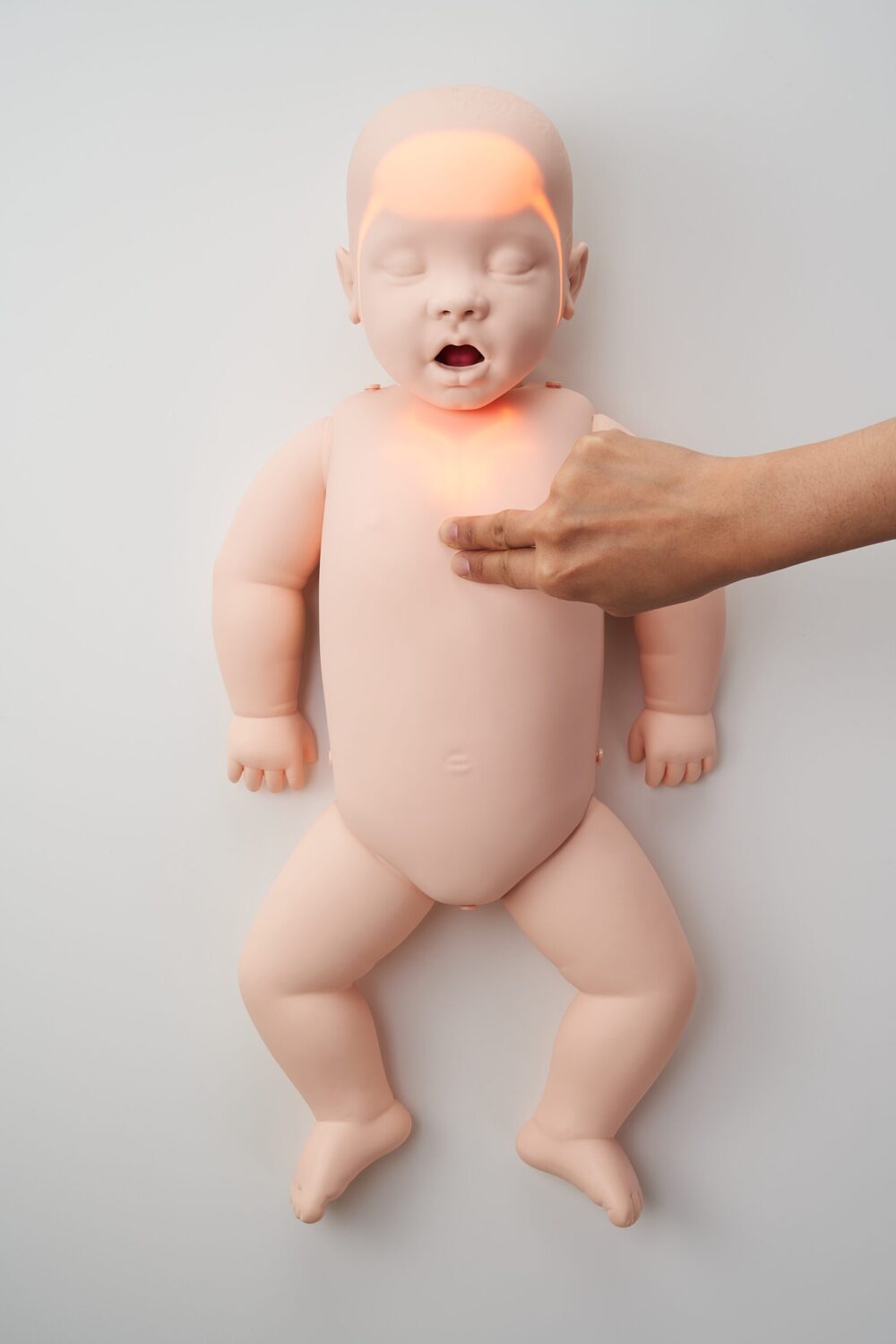 Brayden Baby showing chest and head lights two fingers compression scaled e1737665343559